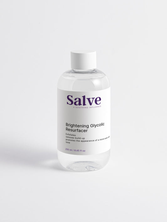 A clear bottle with a white label, containing a skin resurfacing solution and branded as 'SaIve Brightening Glycolic Resurfacer'.