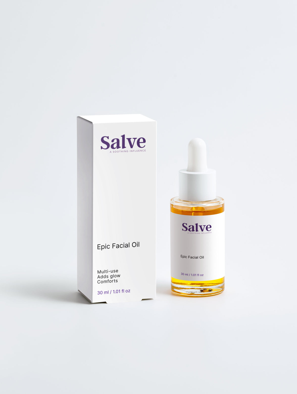 Salve facial oil bottle and packaging on a white background